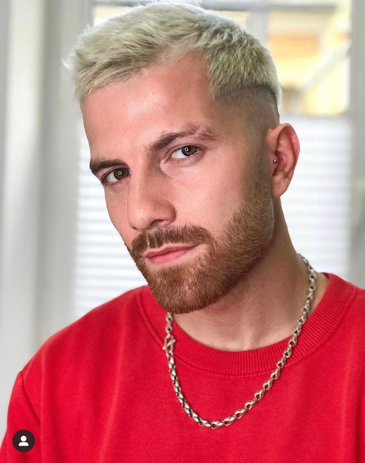   Пирсинг "трагус"