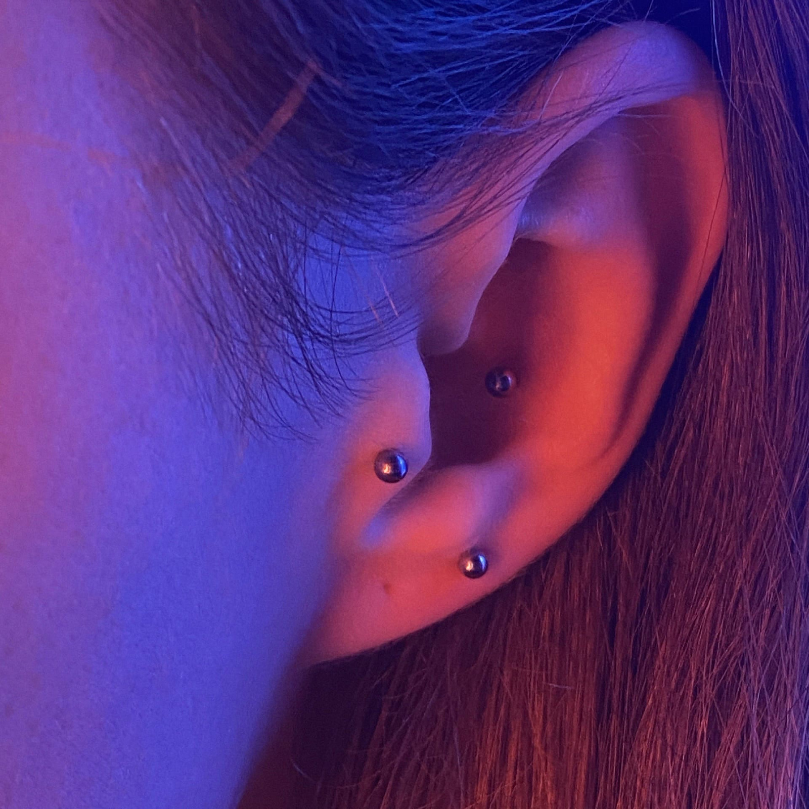 Пирсинг "трагус" "мочка" и "конч"