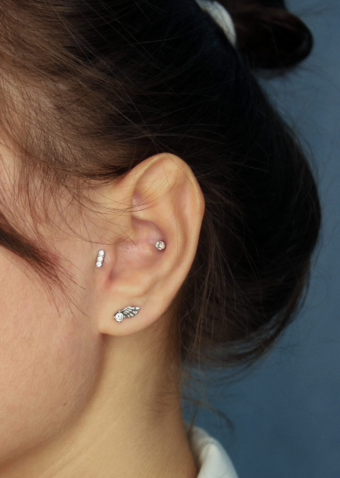 Пирсинг "конч" и "трагус" от Насти